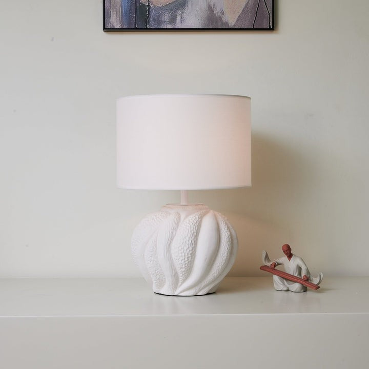 Textured Ceramic Table Lamp with Organic Curves and White Shade