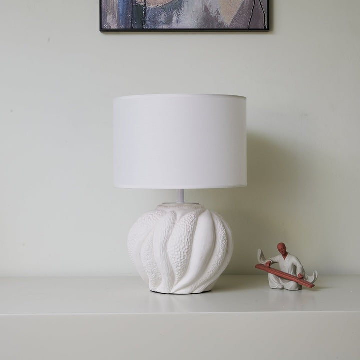 Textured Ceramic Table Lamp with Organic Curves and White Shade
