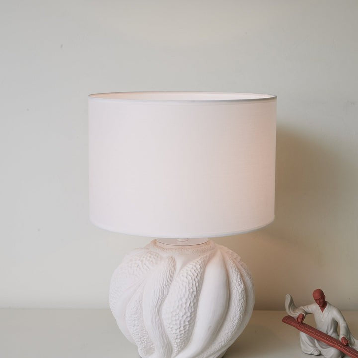 Textured Ceramic Table Lamp with Organic Curves and White Shade